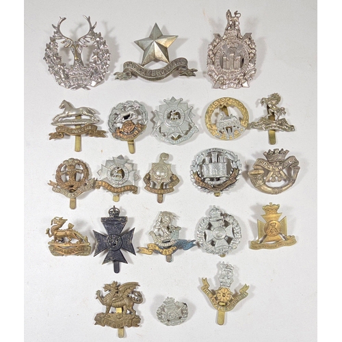 22 Infantry cap badges, including Victorian Rifle Brigade side cap ...