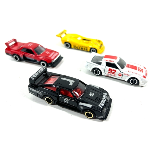 41 - 4 various scale Tomica. No.35 Dome Celica Turbo. No.65 Nissan Skyline Silhouette Formula. No.71 Moon... 