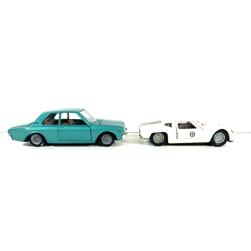49 - 2 Italian Politoys -M series. Ford Taunus 20 M.T.S. (519) in metallic green with brown interior. Plu... 