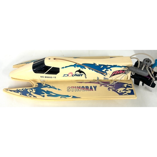 4 - STINGRAY Speed boat with R/C Servos and receiver, I/C conestart marine engine unboxed, also includes... 