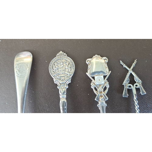 342 - A silver teaspoon, the finial in the form of the City Rifle Club HM Sheffield 1905; another with car... 