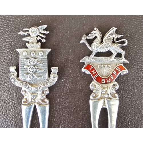 331 - A silver teaspoon, the handle in the form of crossed rifles and badge of The Buffs, HM Birmingham 19... 