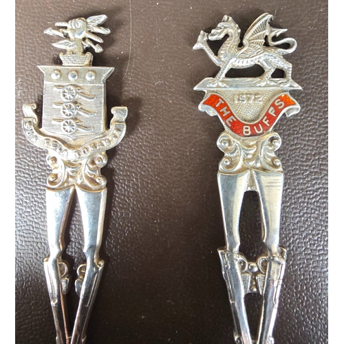 331 - A silver teaspoon, the handle in the form of crossed rifles and badge of The Buffs, HM Birmingham 19... 