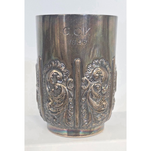 328 - A Victorian silver Christening mug, with heavy repousse panel decoration, HM Sheffield 1895, approx.... 