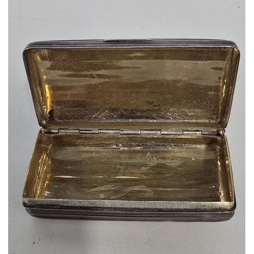 351 - A Georgian rectangular silver Snuff Box, with ribbed decoration overall and gilt interior, by Samuel... 
