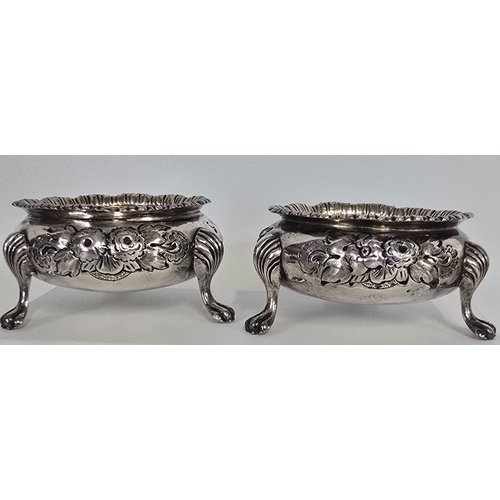 322 - A pair of Victorian silver Salts, HM London 1868, floral repousse decoration and lions feet, GC appr... 