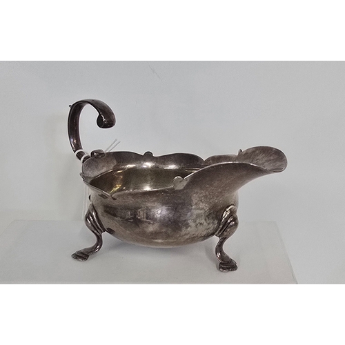 326 - A Georgian silver sauce boat London 1788 (?) weight 125gms.