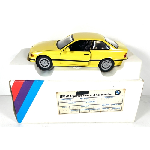 9 - A scarce 1995 BMW Point-of-Sale 1:24 scale model of an E36 3 Series M3. Finished in yellow with blac... 