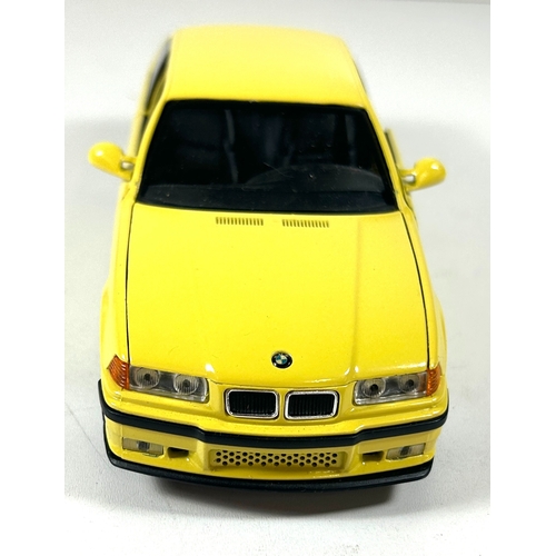 9 - A scarce 1995 BMW Point-of-Sale 1:24 scale model of an E36 3 Series M3. Finished in yellow with blac... 