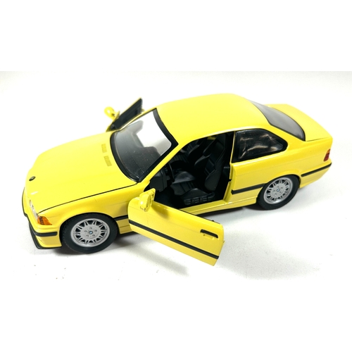 9 - A scarce 1995 BMW Point-of-Sale 1:24 scale model of an E36 3 Series M3. Finished in yellow with blac... 