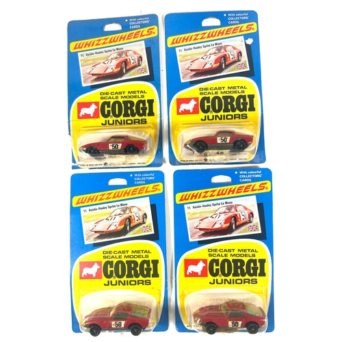 23 - 4 Corgi Juniors 'Whizzwheels' No.11 Austin-Healey Sprite Le Mans. All still sealed onto their origin... 