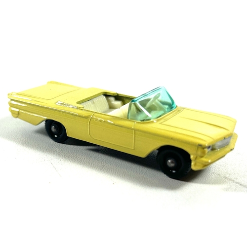 26 - Matchbox Series No.39 Pontiac Convertible. An example with lemon body, black base, white interior, g... 