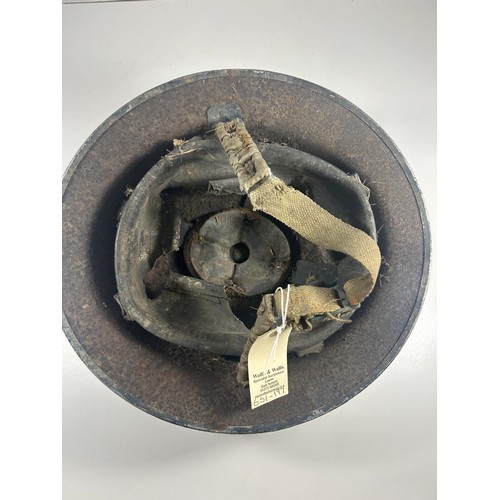 57 - British Army officers peaked cap badged to the Royal Army pay corps. Also a WW2 steel helmet with tr... 