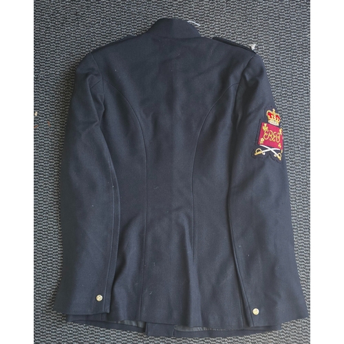60 - An ERII Grenadier Guards Blue Patrol Jacket with Colour Sergeant's Arm Badge. GC