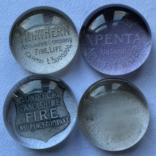 36 - EARLY 20TH CENTURY CIRCULAR ADVERTISING PAPERWEIGHTS (4)
Northern Assurance Company, Apenta Water, L... 