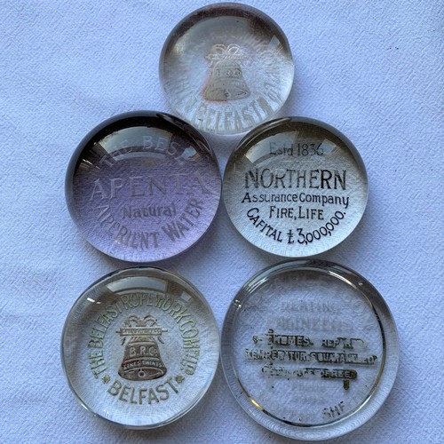 38 - EARLY 20TH CENTURY CIRCULAR ADVERTISING PAPERWEIGHTS (5)
2x Belfast Rope Works, Apenta Water, Northe... 