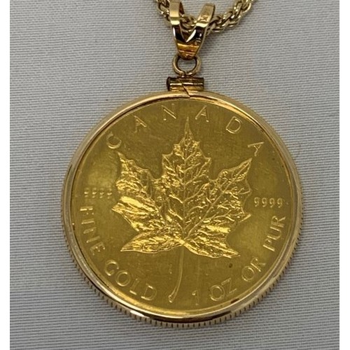 59 - A Canadian 50 dollar 1oz fine gold coin dated 2007 mounted in 14ct 'clamp' mount (33g inc mount, coi... 