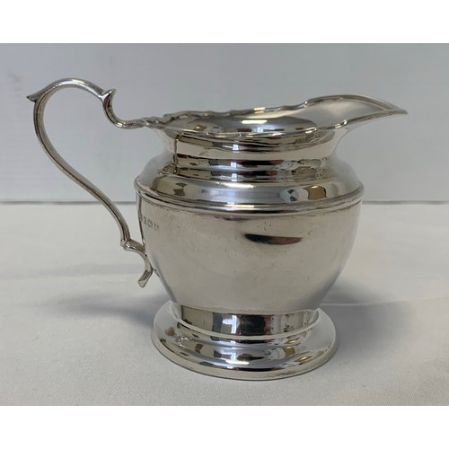 55 - A Three Piece Silver Tea Set with a Silver Coffee Pot
Tea Pot (374g), Sugar Bowl (140g) and Milk (10... 