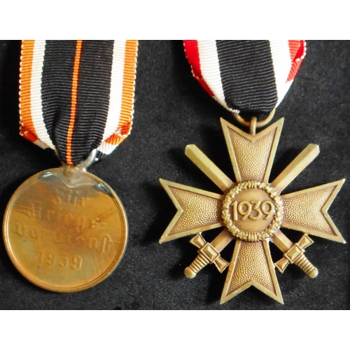 20 - WW II War Merit Cross with swords & War Merit Medal. (2)