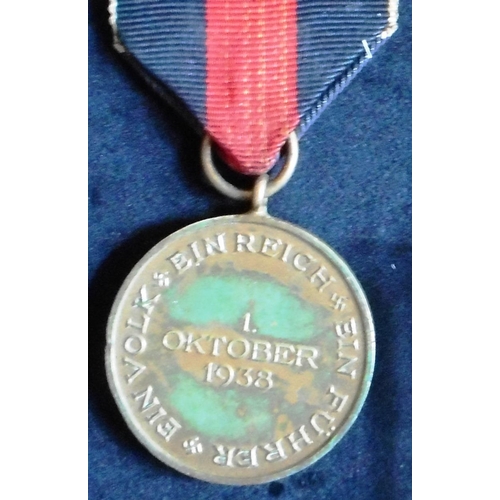 21 - The Sudetenland Medal 1938. Mounted as worn.