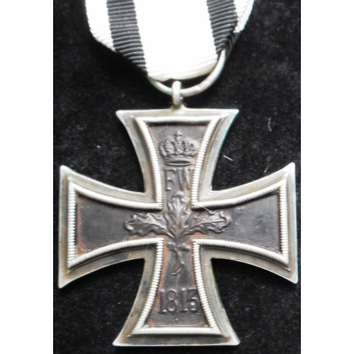 72 - WW I Iron Cross 2nd class. Non-combatants ribbon. Suspension ring stamped NC.