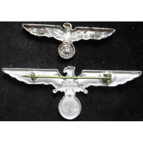 88 - (2) WW II NS-RKB metal chest eagle. (Krieger Bund). Also a metal cap eagle, with defective prongs