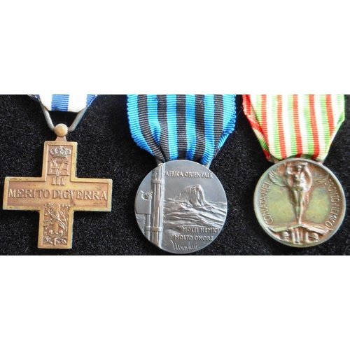 132 - Italy. (3) WW I War Merit Cross with ribbon, Commemorative Medal for East Africa 1935-36 with combat... 