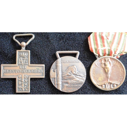 133 - Italy. (3) WW I War Merit Cross, Commemorative Medal for East Africa 1935-36, Italian-Austrian War M... 