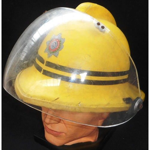 180 - Fire helmet. Yellow Cromwell cork with visor. 1st pattern Merseyside F.B. badge. Sub.O’s markings.