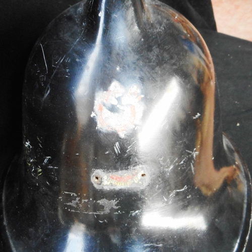 187 - Fire helmet. Black fibreglass shell. Remains of badge, 2 holes drilled.