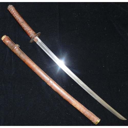 200 - Japanese Sword. 27 inch blade with much rust. Leather covered scabbard and hilt, looks to be WW II e... 