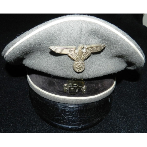 208 - Waffen SS officer’s cap. Well made with velvet cap band, silk lined interior with soft leather sweat... 