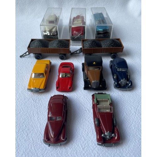 118 - A Group of Model Cars inc 3 x Revell Praline in orignal cases and 6x Wiking models