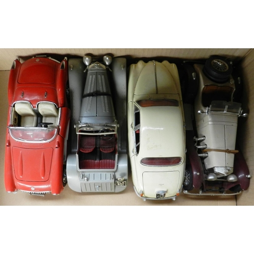 106 - Box of 10 larger scale car models.