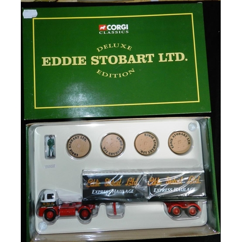 12 - Corgi Classics. Eddie Stobart De Luxe Edition.  14302 Foden “21 artic trailer with containers, figur... 