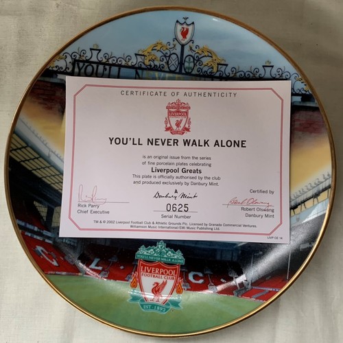 137 - Liverpool FC Interest: A box of Liverpool FC Memorabilia to include a small piece of the kop, progra... 