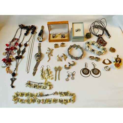 49 - A Large Collection of Costume / Dress Jewellery in a Cantilever Jewellery Box