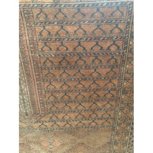 191 - Turkoman Hatchli Rug with Numerous Motifs on Brick Red Ground
Approx. 175 x 124 cm