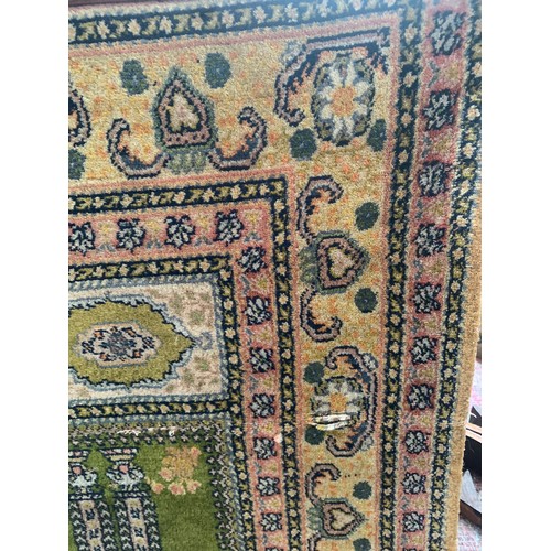 192 - Fereghan style prayer rug on green ground
AF
Approx. 180 x 108 cm