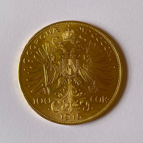 110 - Austrian 100 Corona gold coin 1915 mint mark St Schwartz