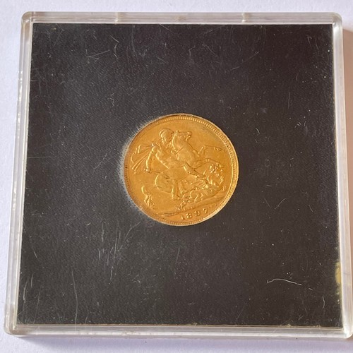 120 - 1897 Sovereign in Perspex case  (signed BP for the designer Benedetto Pistrucci)