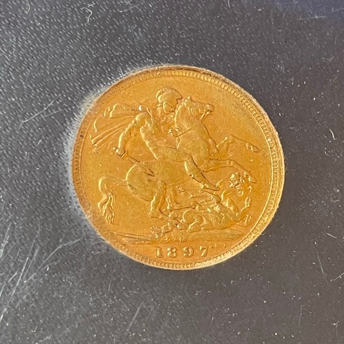 120 - 1897 Sovereign in Perspex case  (signed BP for the designer Benedetto Pistrucci)