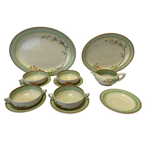 92 - Part Clarice Cliff Dinner Service (12)
Including a Large Oval Plate, a Smaller Plate, a Jug, 5 Sauce... 