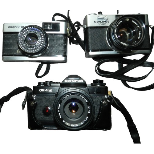 4 - 3 x Olympus cameras. Trip, 35 RD, OM-4 Ti.