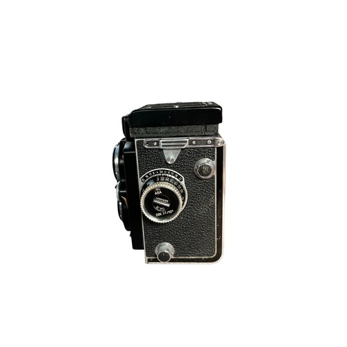 5 - Rolleiflex camera with original receipt & a Rollei Metal Tropical Field case.