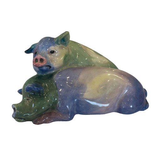 319 - Royal Doulton, an rare, early Doulton figure group 'Snoozing' modelled as two recumbent pigs with ea... 