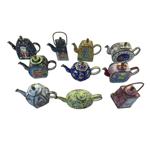 298 - Enamel hand painted Trade+Aid collectable small tea pots , approximately 9cm tall. No obvious signs ... 