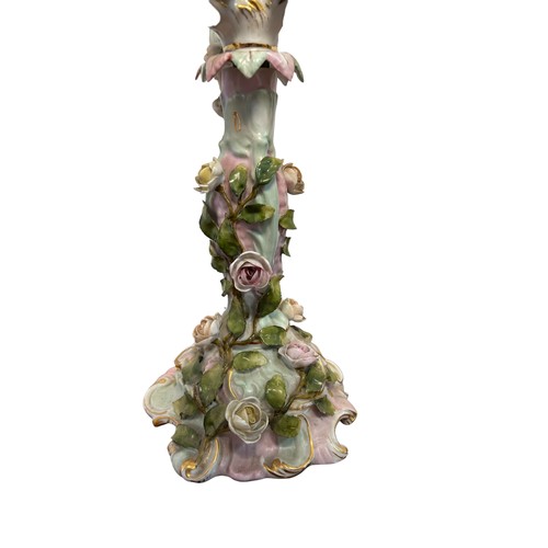 306 - A pair of Sitzendorf porcelain three arm candlesticks with elaborate flowers design
approx 33cm tall