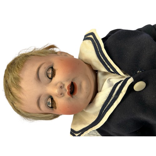 128 - A Kammer & Reinhardt / Simon & Halbig bisque character doll, German
Approx. 58cm tall