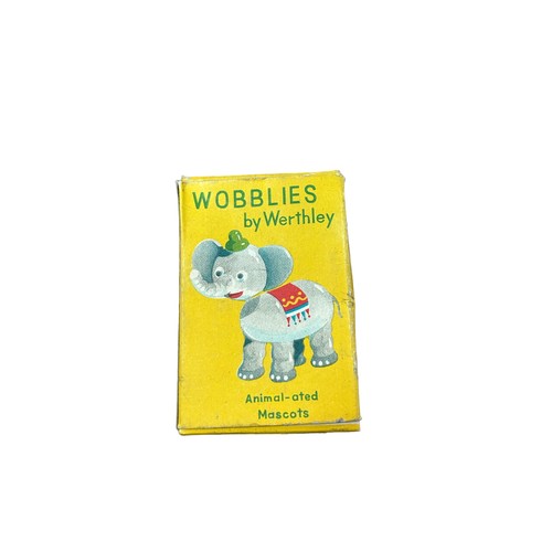 21 - A small collection of Vintage Toys - Four Vintage Lead Toys & a boxed Wobblies by Werthley